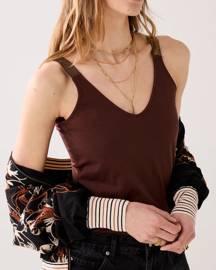 Top reversible de tirantes