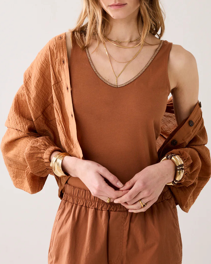 Top reversible con ribete brillante