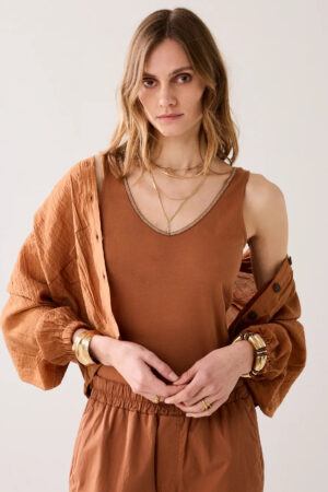Top reversible con ribete brillante