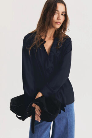 Camisa con volantes